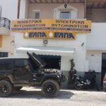 Εξωτερική όψη του συνεργείου Δασυράς Δημήτριος στην Τήνο με όχημα επισκευής.