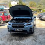 Subaru Outback με ανοιχτό καπό στο AUTO ΠΑΠΑΔΟΠΟΥΛΟΣ.